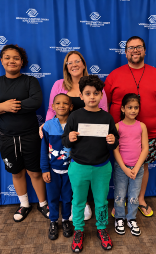 First Lutheran makes donation to Boys, Girls Club